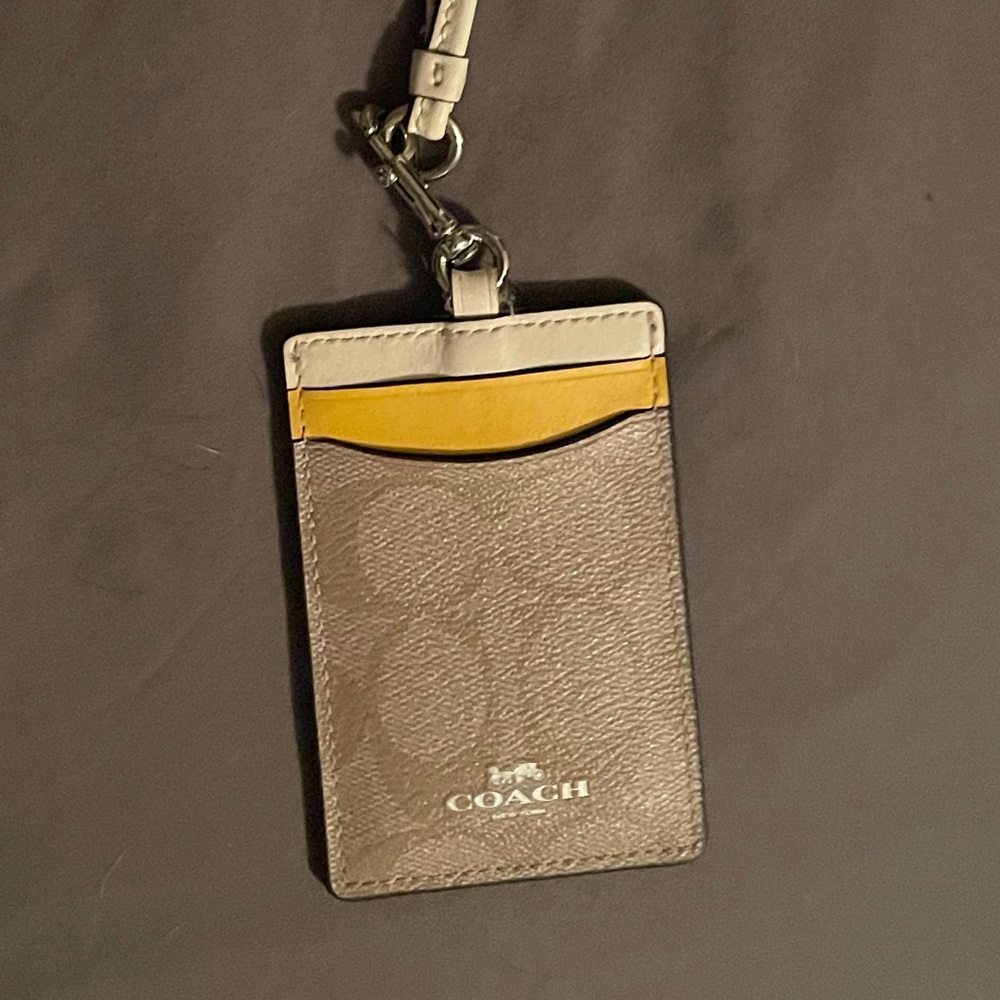 Yellow/beige coach lanyard